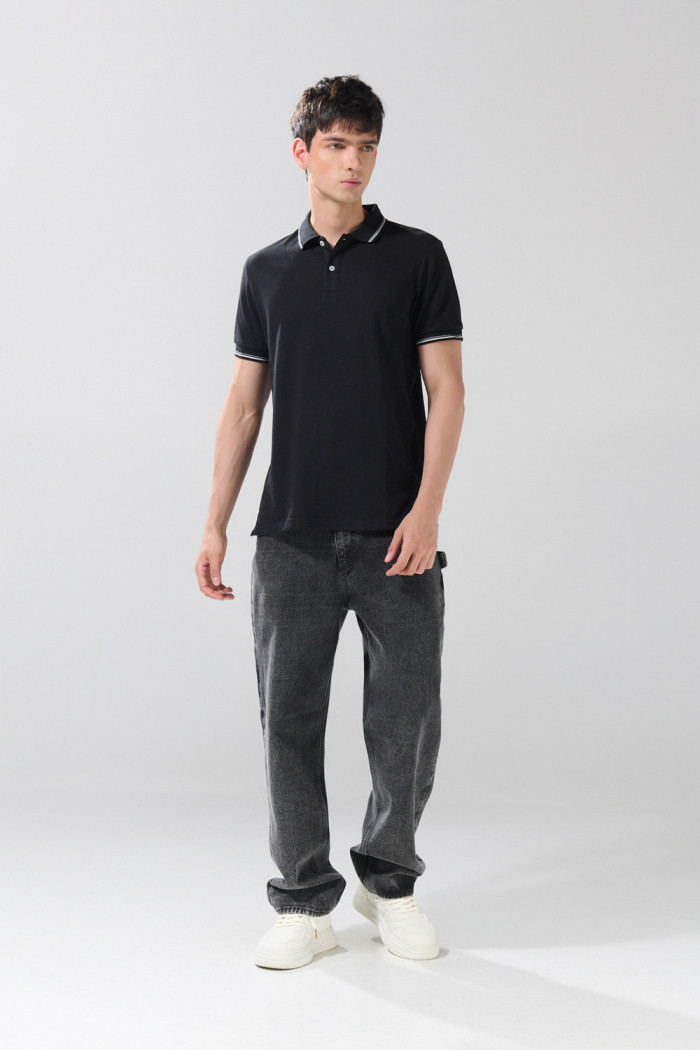 Camiseta polo infaltables manga corta unicolor con botones
