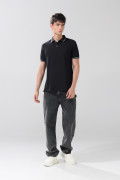Camiseta polo infaltables manga corta unicolor con botones
