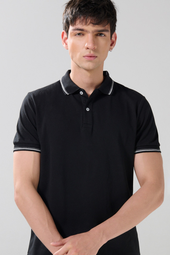 Camiseta polo infaltables manga corta unicolor con botones
