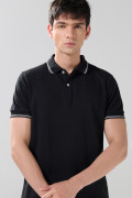 Camiseta polo infaltables manga corta unicolor con botones
