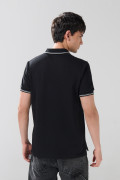 Camiseta polo infaltables manga corta unicolor con botones
