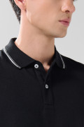 Camiseta polo infaltables manga corta unicolor con botones
