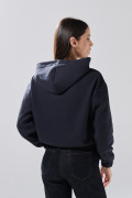 Buzo azul intenso college oversize perchado con capota