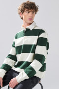 Buzo crema claro oversize con rayas verdes y cuello polo