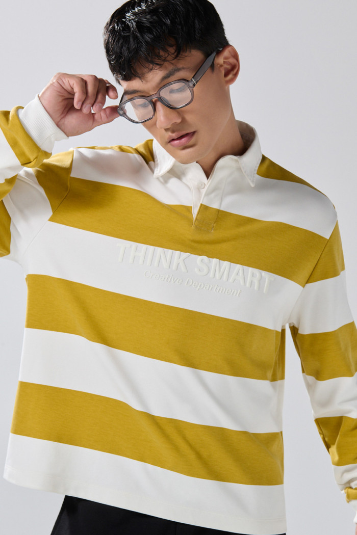 Buzo crema oversize a rayas con cuello polo y arte college