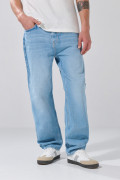 Jean baggy tiro medio azul con bota ancha y desgastes
