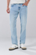 Jean slim azul claro con tiro bajo, bolsillos y desgastes
