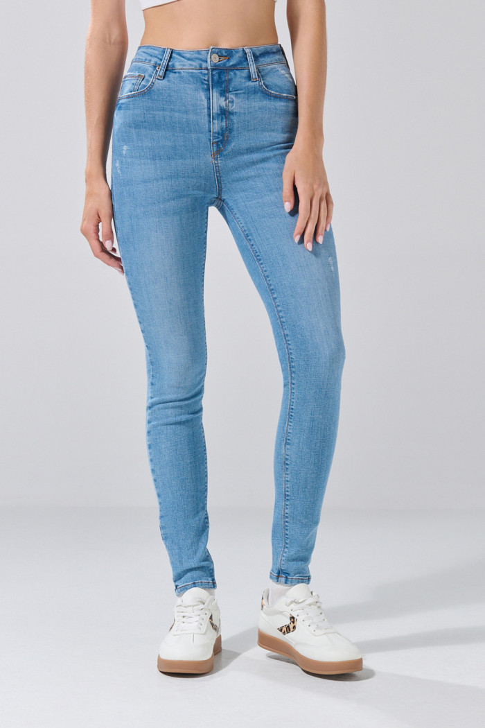 Jean jegging infaltables tiro súper alto azul con desgastes
