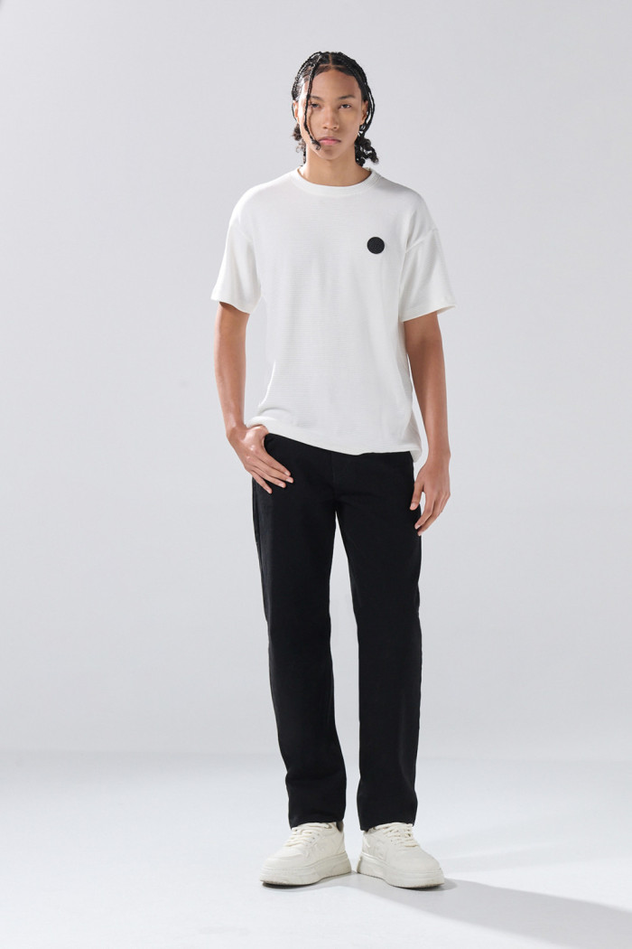 Jean 90´S infaltables negro con tiro bajo y bota recta
