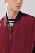 Chaqueta doble faz bomber acolchada unicolor con bolsillos
