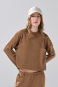 Buzo cuello redondo unicolor oversize en tela texturizada
