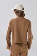 Buzo cuello redondo unicolor oversize en tela texturizada
