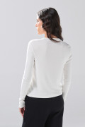 Camiseta en rib ajustada unicolor con manga larga