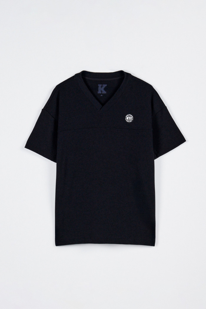 Camiseta azul intensa cuello V en algodón con arte college