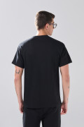 Camiseta en algodón hombro rodado unicolor manga corta