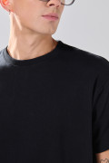 Camiseta en algodón hombro rodado unicolor manga corta