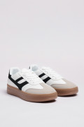 Tenis unicolores de plataforma con contrastes y cortes
