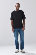 Camiseta unicolor oversize manga corta con texturas sutiles
