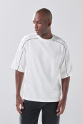 Camiseta unicolor en tela pesada manga corta oversize