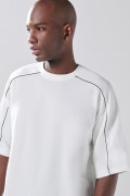 Camiseta unicolor en tela pesada manga corta oversize