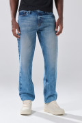 Jean azul medio 90´S con tiro bajo, desgastes y bota recta
