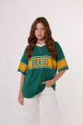 Camiseta oversize cuello V verde college de Fan Edition
