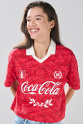 Camiseta crop top roja de Coca-Cola oversize con cuello polo
