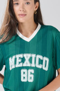 Camiseta verde oversize college de Fan Edition con cuello V
