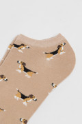 Medias tobilleras unicolores con texturas y artes de perritos
