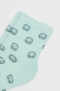 Medias unicolores cortas de caritas felices con elástico
