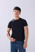 Camiseta infaltables cuello redondo unicolor con fit ceñido
