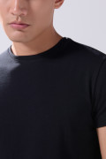 Camiseta infaltables cuello redondo unicolor con fit ceñido
