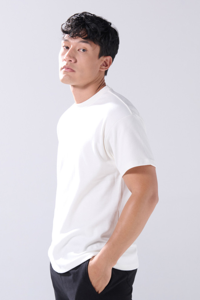 Camiseta en algodón holgada unicolor con manga corta
