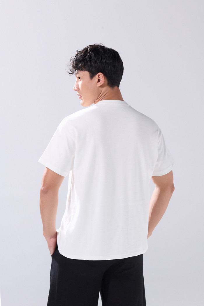 Camiseta en algodón holgada unicolor con manga corta
