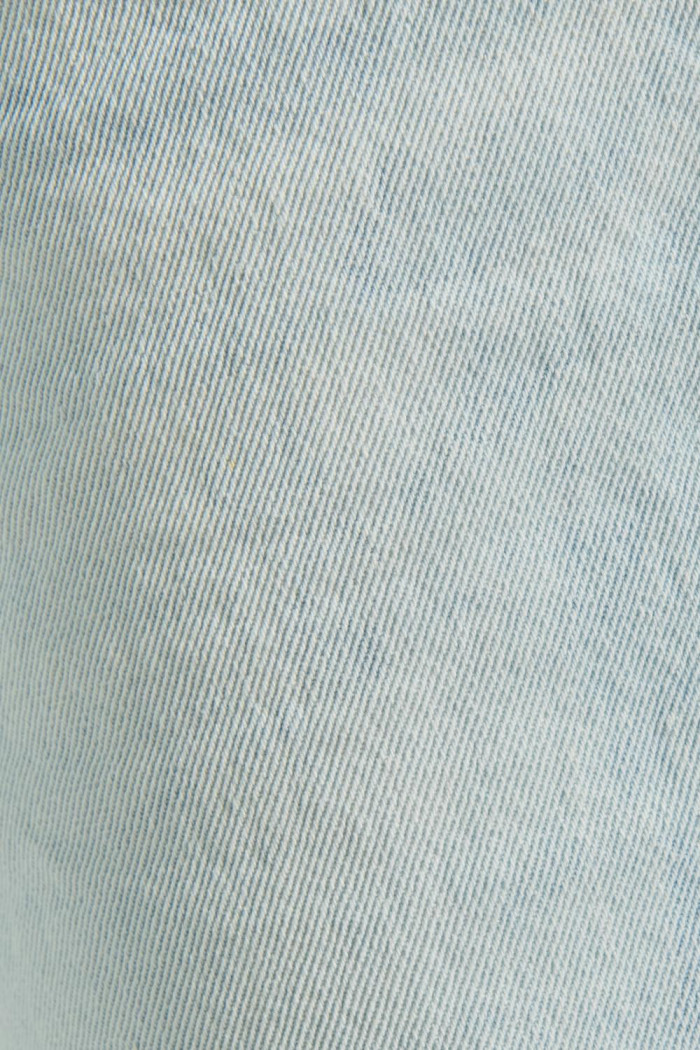 Jean 90´S azul claro con desgastes, tiro alto y bota ancha
