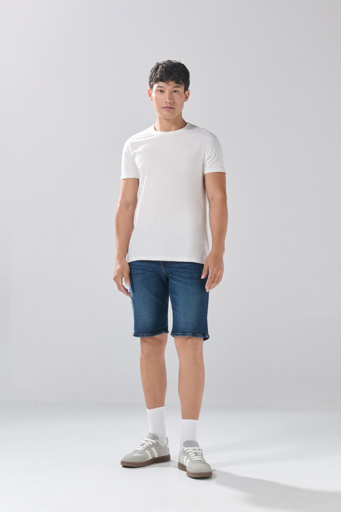 Bermuda de jean azul oscura slim infaltables con tiro bajo
