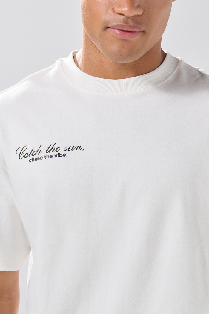 Camiseta unicolor holgada manga corta con texto de Boho Club
