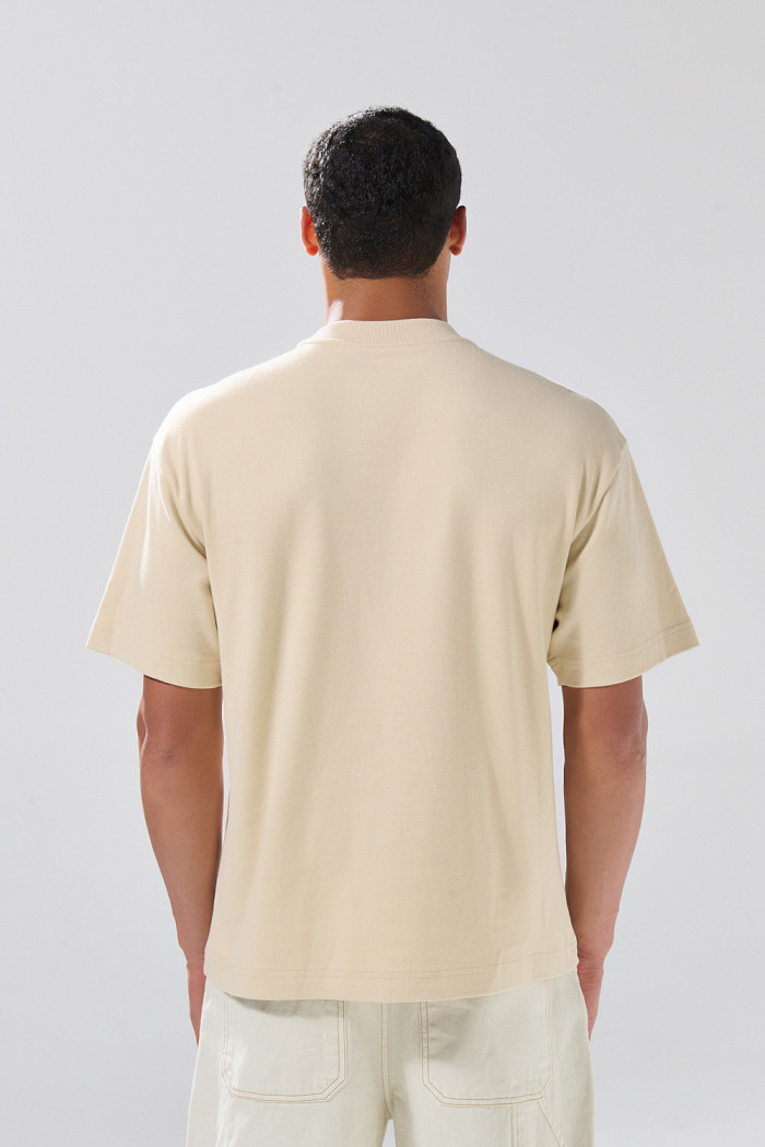 Camiseta oversize cuello redondo unicolor con arte de Poetry
