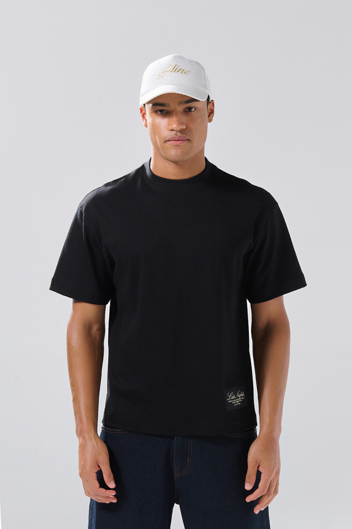 Camiseta cuello redondo unicolor con texto de Poetry
