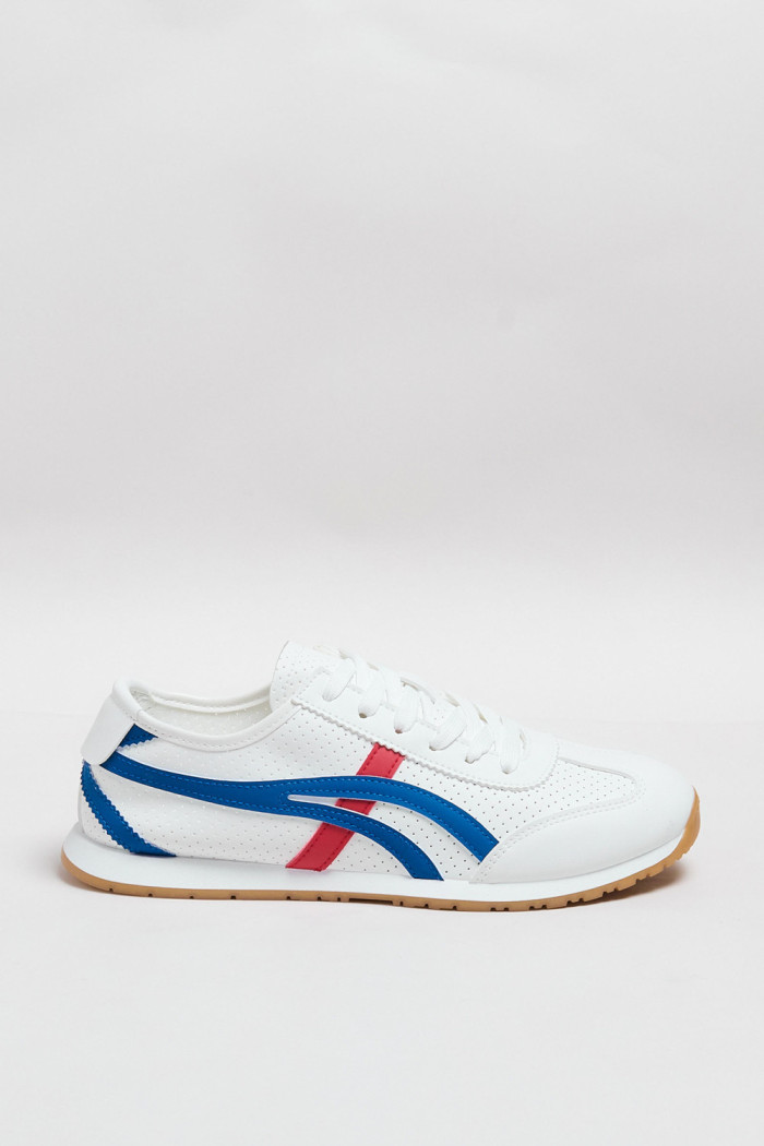 Tenis unicolores casuales con texturas perforadas y diseños
