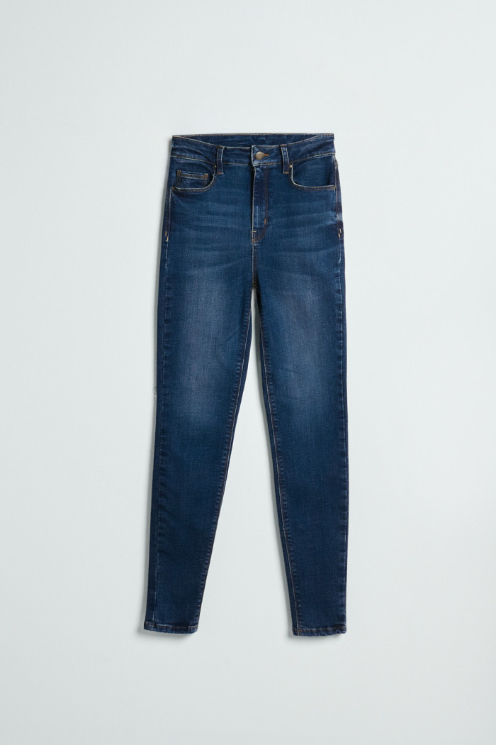 Jean azul oscuro súper skinny infaltables con tiro súper alto