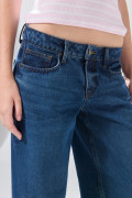 Jean open leg tiro bajo azul infaltables con bota ancha

