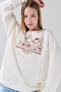 Buzo oversize cuello redondo crema con arte de Snoopy
