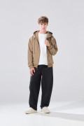 Buzo oversize unicolor con capota, cremallera y bolsillo
