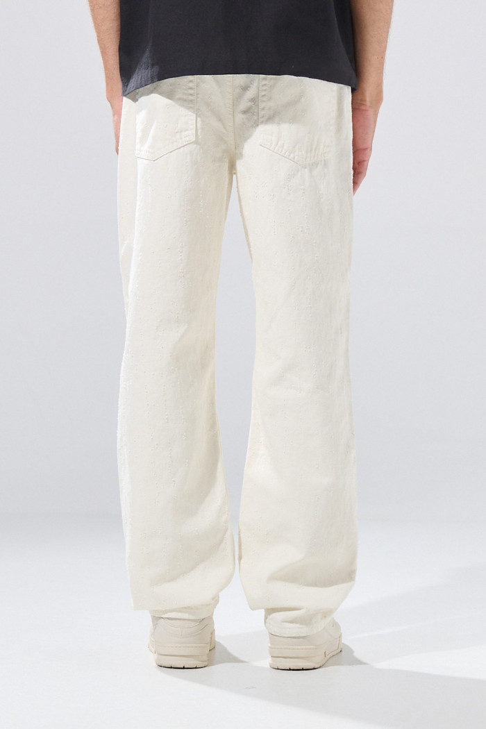 Jean loose crema de Poetry con tiro bajo y bota ancha