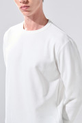 Buzo cuello redondo infaltables con bordes en rib unicolor

