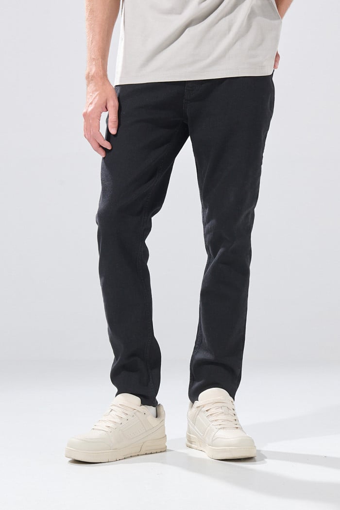 Jean negro infaltables skinny con cremallera y tiro bajo
