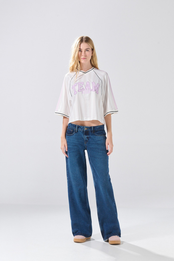 Jean open leg infaltables azul oscuro con bota ancha
