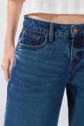 Jean open leg infaltables azul oscuro con bota ancha
