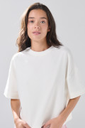Camiseta crop top unicolor oversize con cuello redondo
